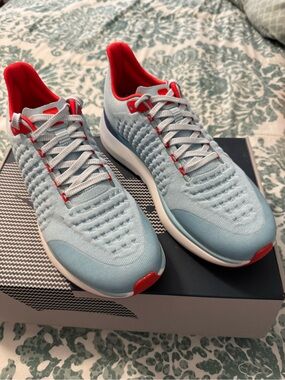 Light Blue Rabbit brand Athletic Sneakers with Red/orange Accents. NWT